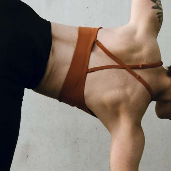 assorted chips with vegetable on brown wooden chopping board